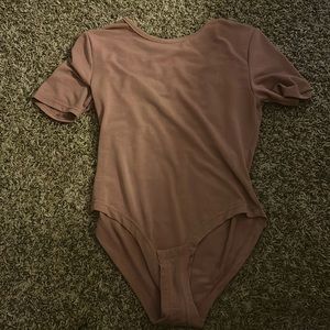 Blush pink body suit estimately size medium